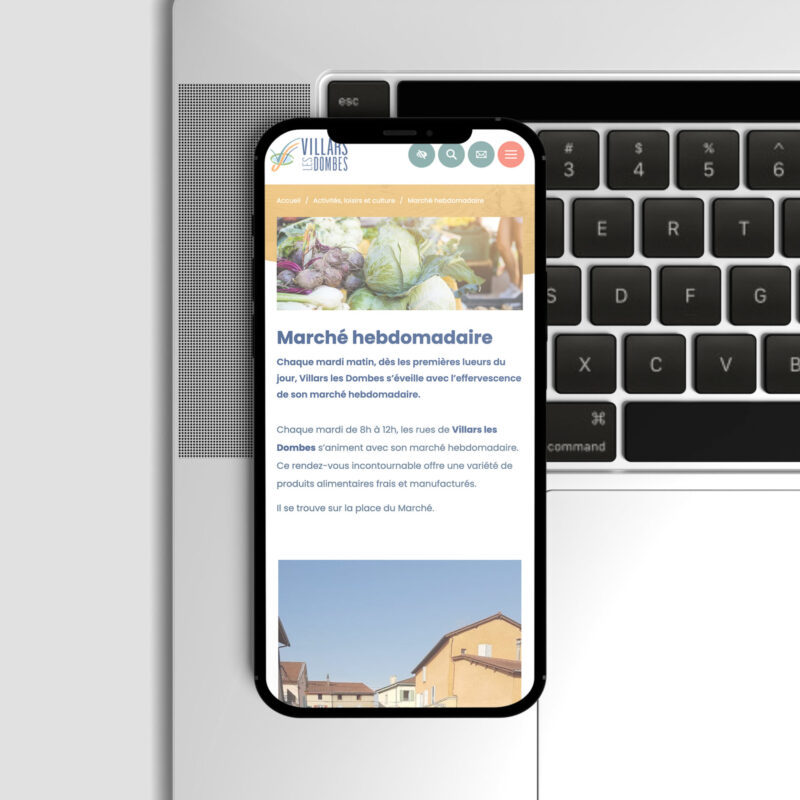 Version responsive du site internet de la mairie de Villars les dombes présentée sur un smartphone