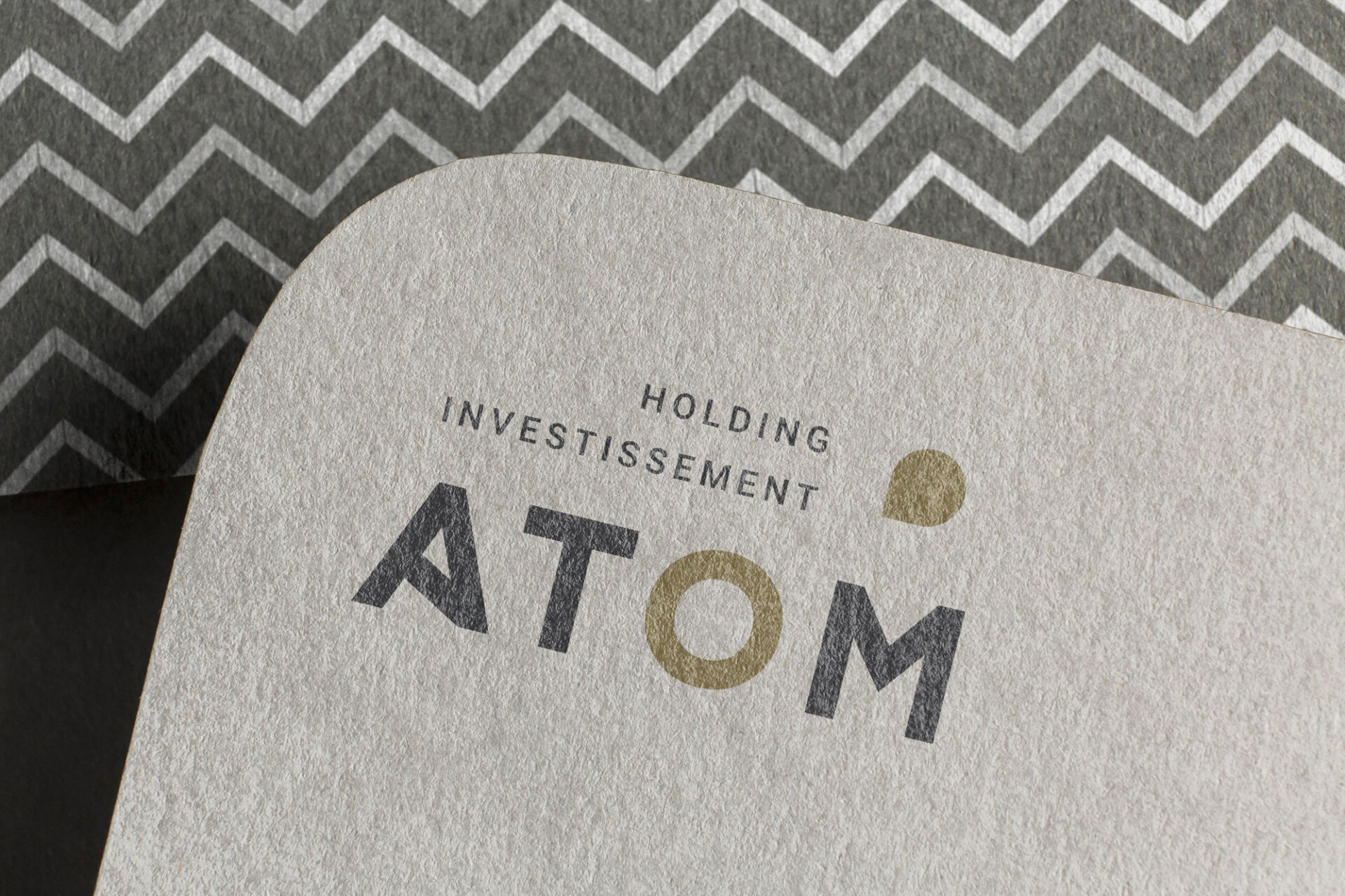 Logotype créé par emergence graphique pour la holding d'investissement Atom